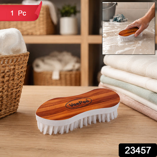 Wukusy Veepee ergonomic cloth washing brush with wooden handle and soft bristles for gentle cleaning of fabrics and textiles.