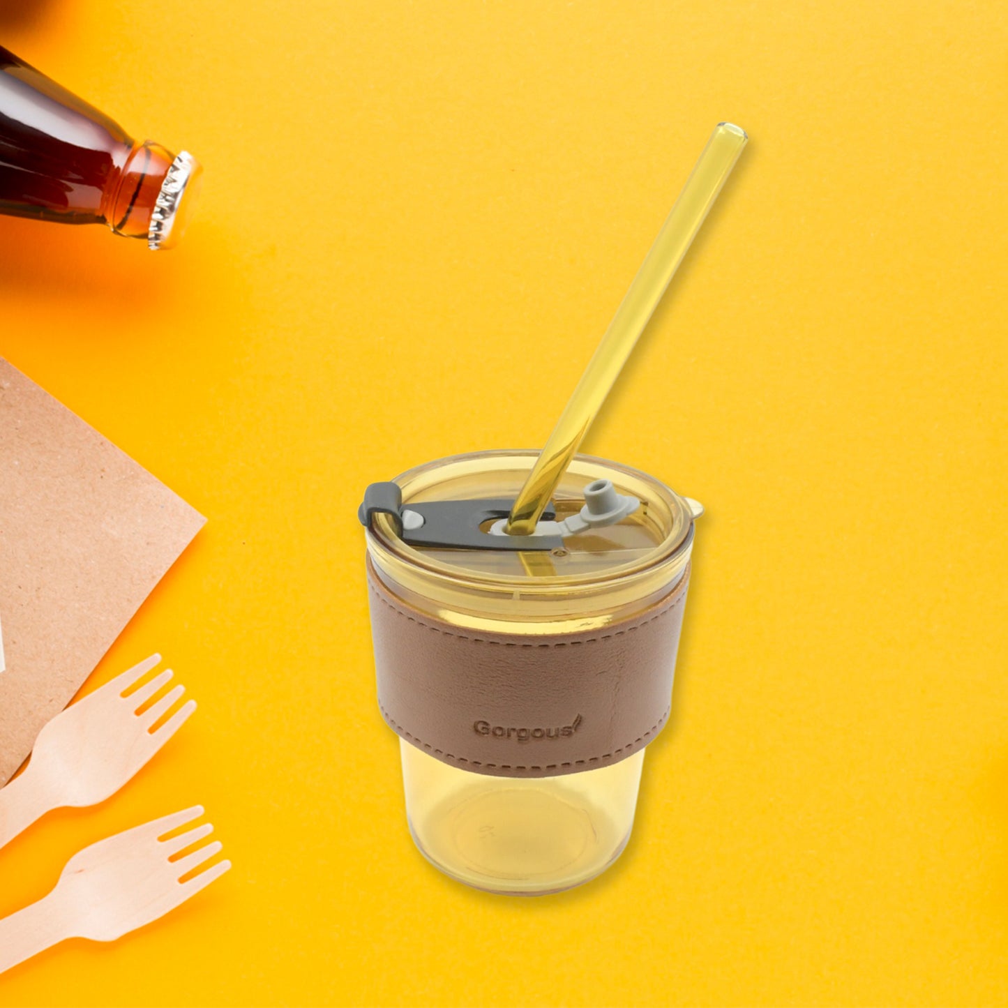 Wukusy glass coffee mug with leakproof lid, glass straw, and heatproof sleeve, ideal for travel and hot beverages