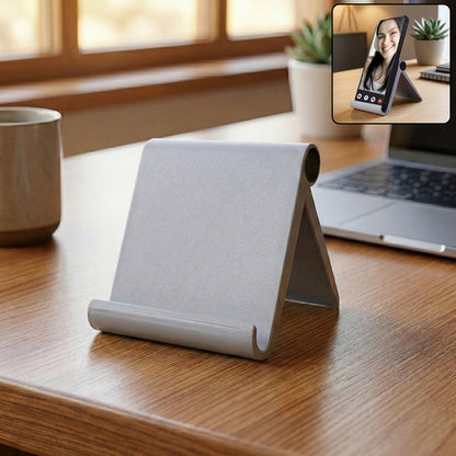 Wukusy plastic foldable desktop mobile stand holding a smartphone, designed for easy viewing and adjustable positioning.
