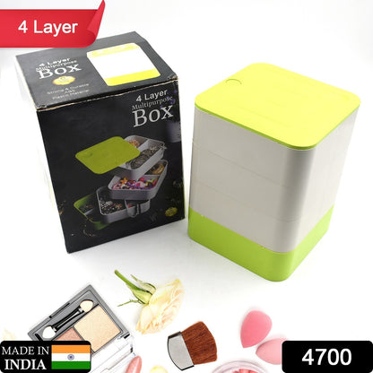 Wukusy 4700 four-layer jewelry box with 360-degree rotating lid, organized for jewelry, earrings, and accessories storage.