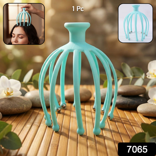 Wukusy manual scalp massager for stress relief with multiple massage nodes and ergonomic handle in a close-up view.