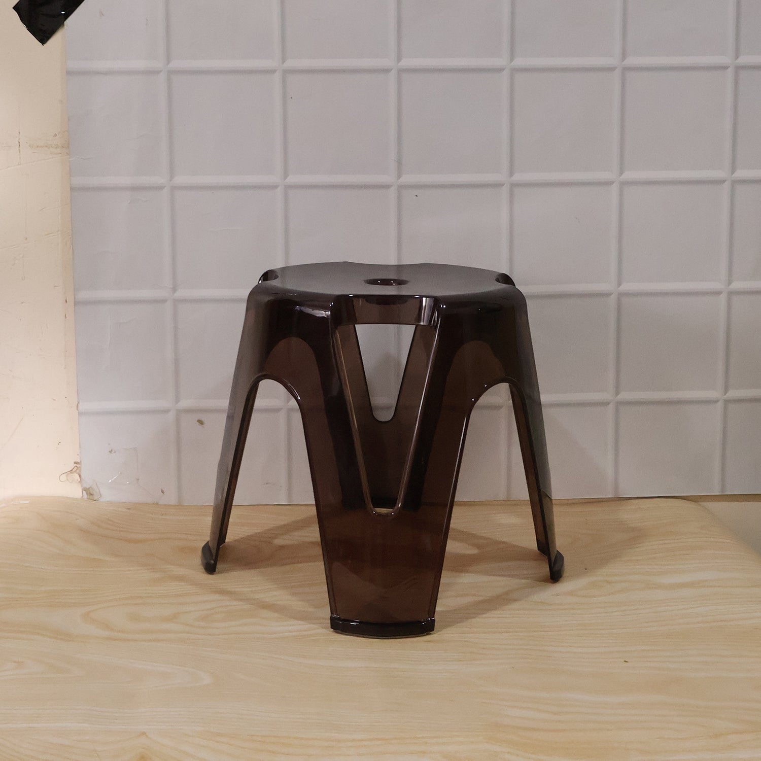 Wukusy plastic sitting stool in beige, durable for home, bathroom, and outdoor use, showing a compact, sturdy design.