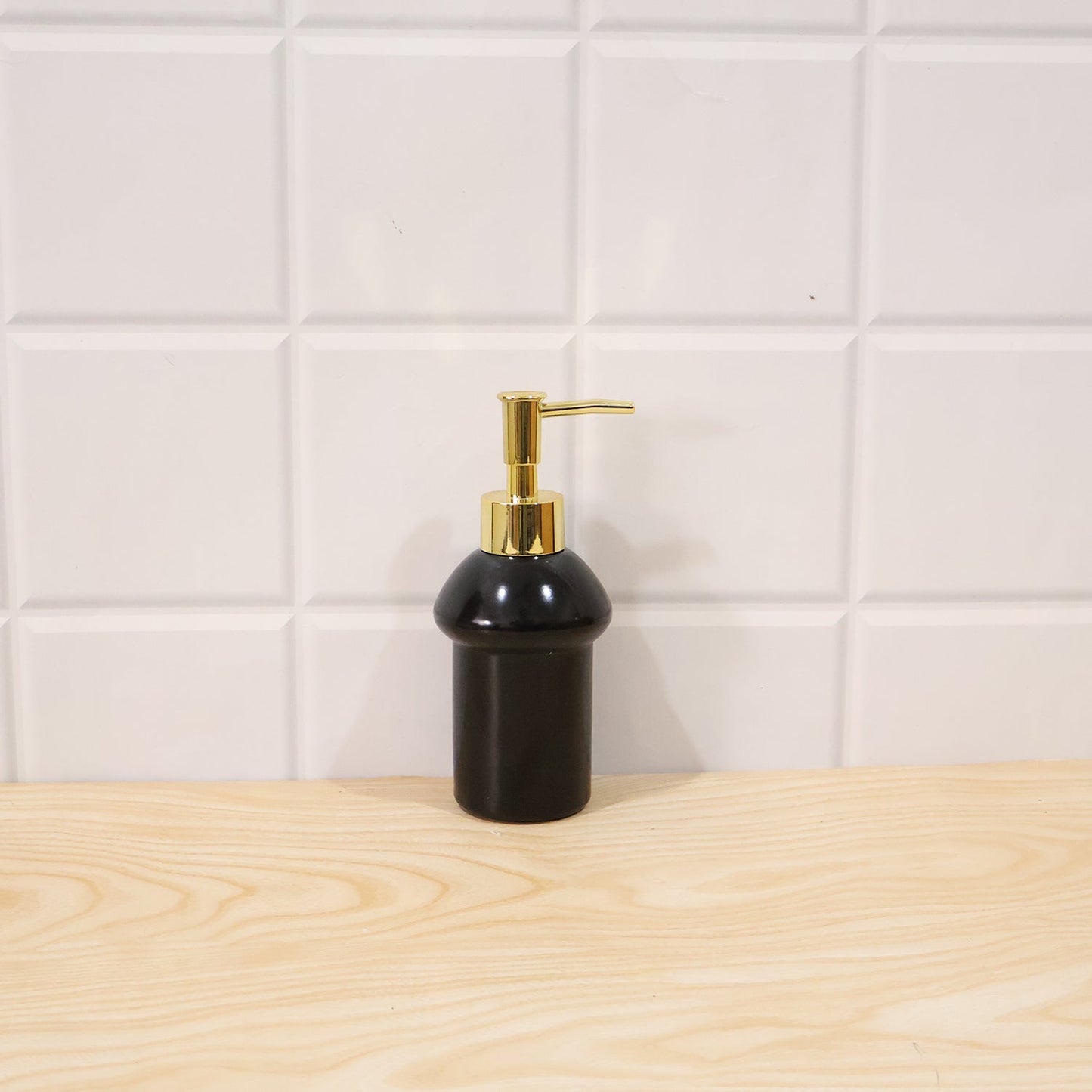Black glass liquid soap dispenser bottle with gold pump from Wukusy, refillable, elegant bathroom or kitchen accessory.