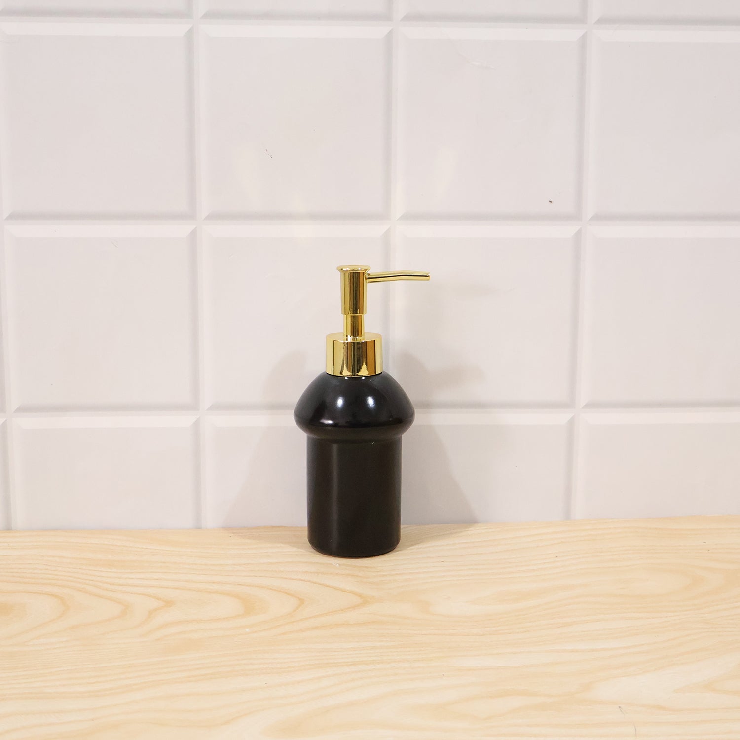 Black glass liquid soap dispenser bottle with gold pump from Wukusy, refillable, elegant bathroom or kitchen accessory.