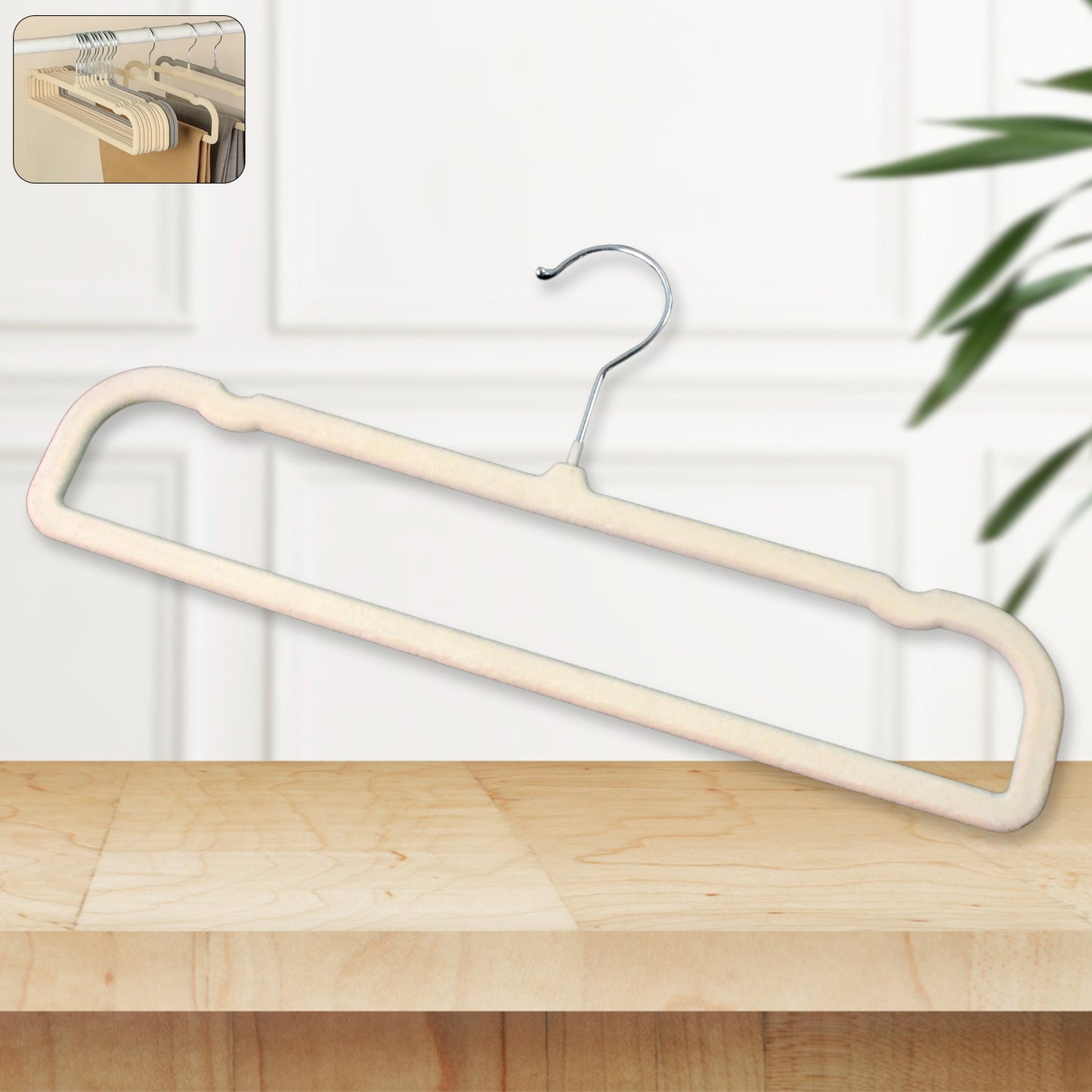 Wukusy premium velvet non-slip cloth hanger with metal hook, single black hanger for clothes storage and organization.