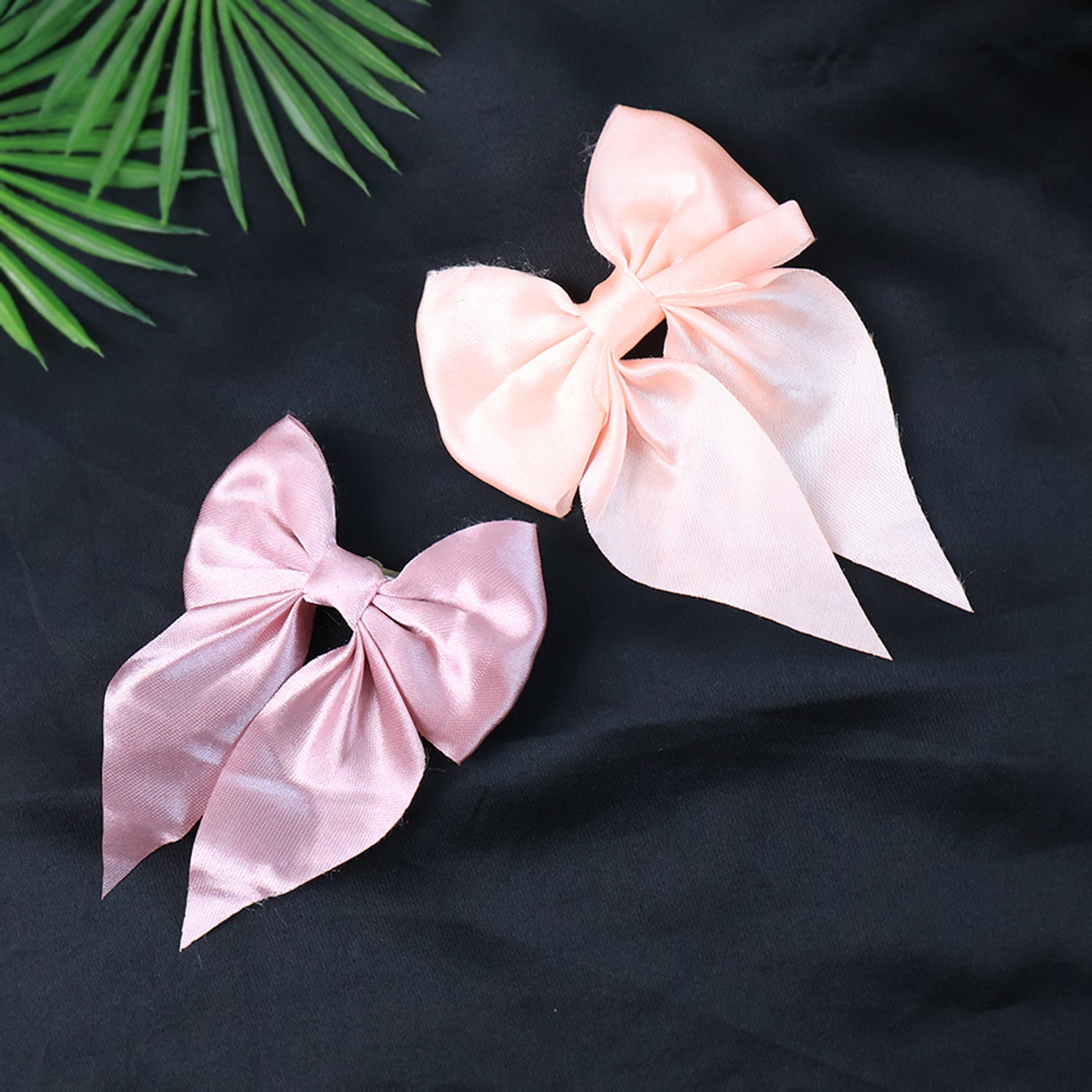 Set of 10 Wukusy satin bow hair clips for girls and women, featuring colorful, glossy bows for stylish hair accessories.
