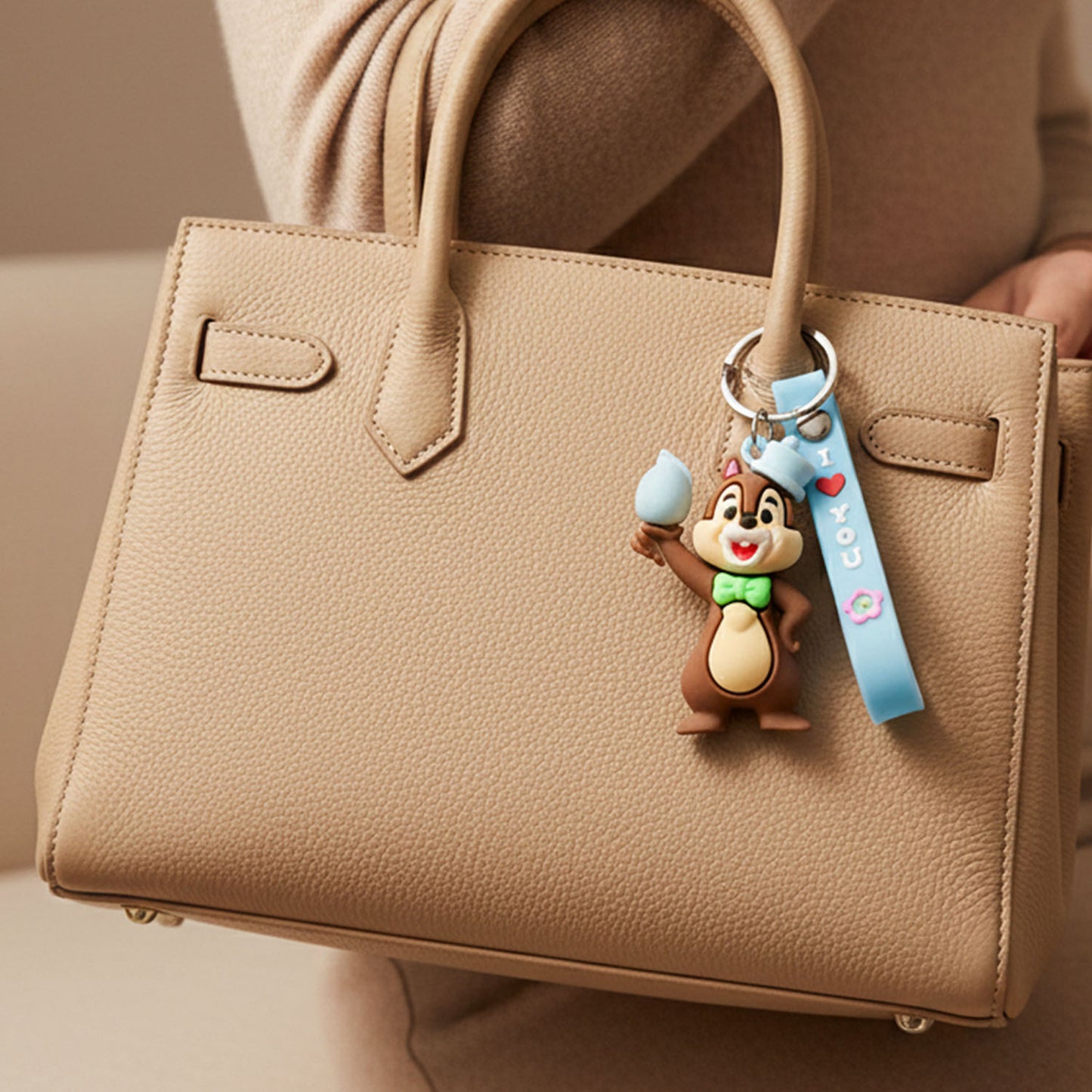 Cute cartoon squirrel character keychain by Wukusy, featuring a detailed, colorful squirrel design with a keyring attachment.
