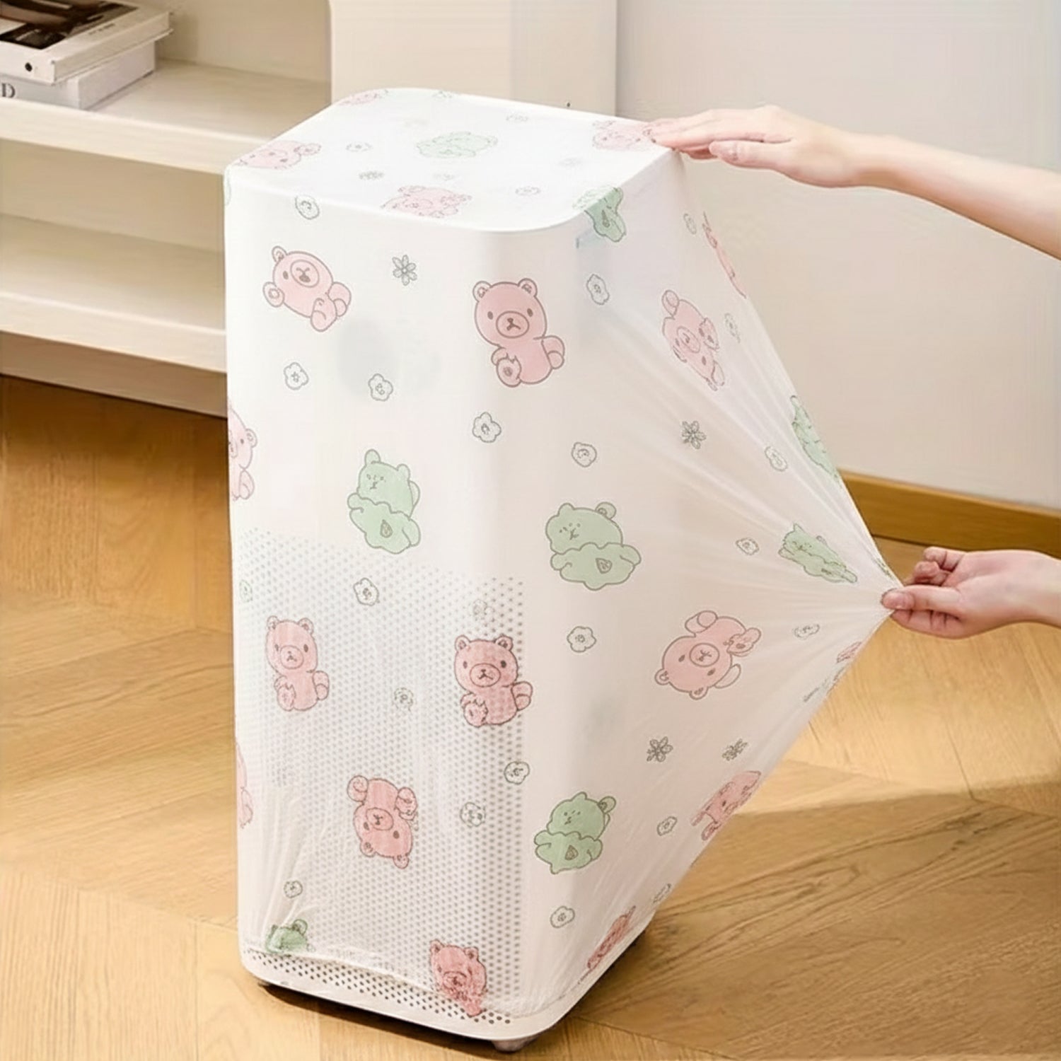 Wukusy B-grade reusable split air conditioner dust protection cover draped over an AC unit, protecting it from dust and debris.