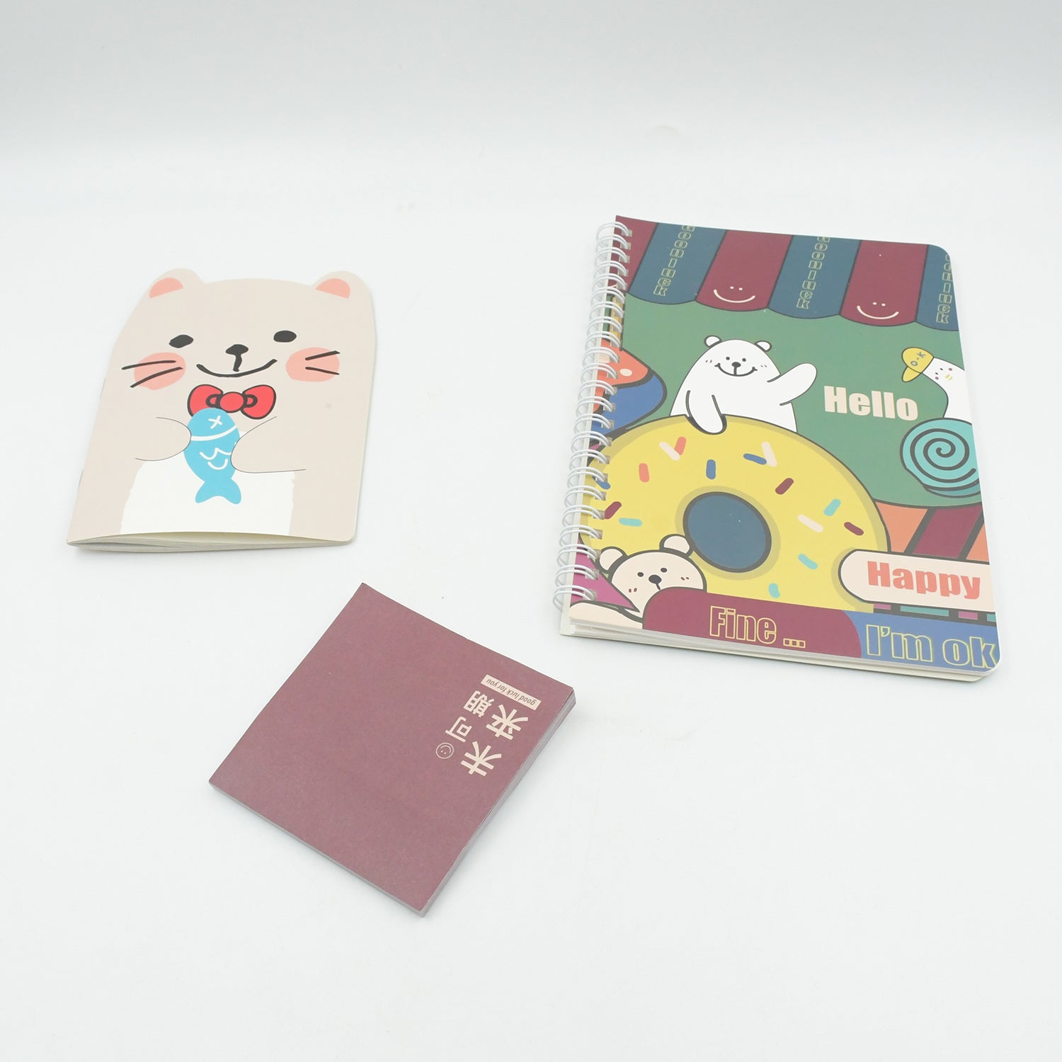 Wukusy cartoon stationery box with school supplies including pens, erasers, sharpeners, stickers, and refills in a colorful design.