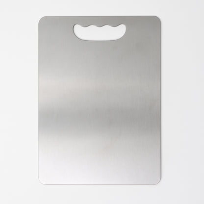 Wukusy Supermom Medium Stello stainless steel chopping board for kitchen prep with sleek, durable surface and modern design.