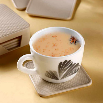 Set of six Ganesh-themed square coasters with storage box from Wukusy, ideal for home and kitchen decor.
