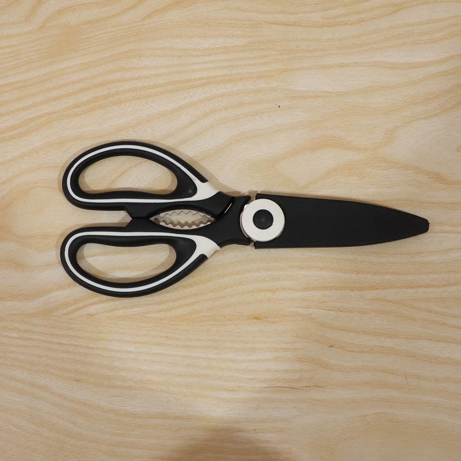 Wukusy 3-in-1 multipurpose kitchen scissors with steel blades for cutting, opening bottles, and more, displayed on a white background.