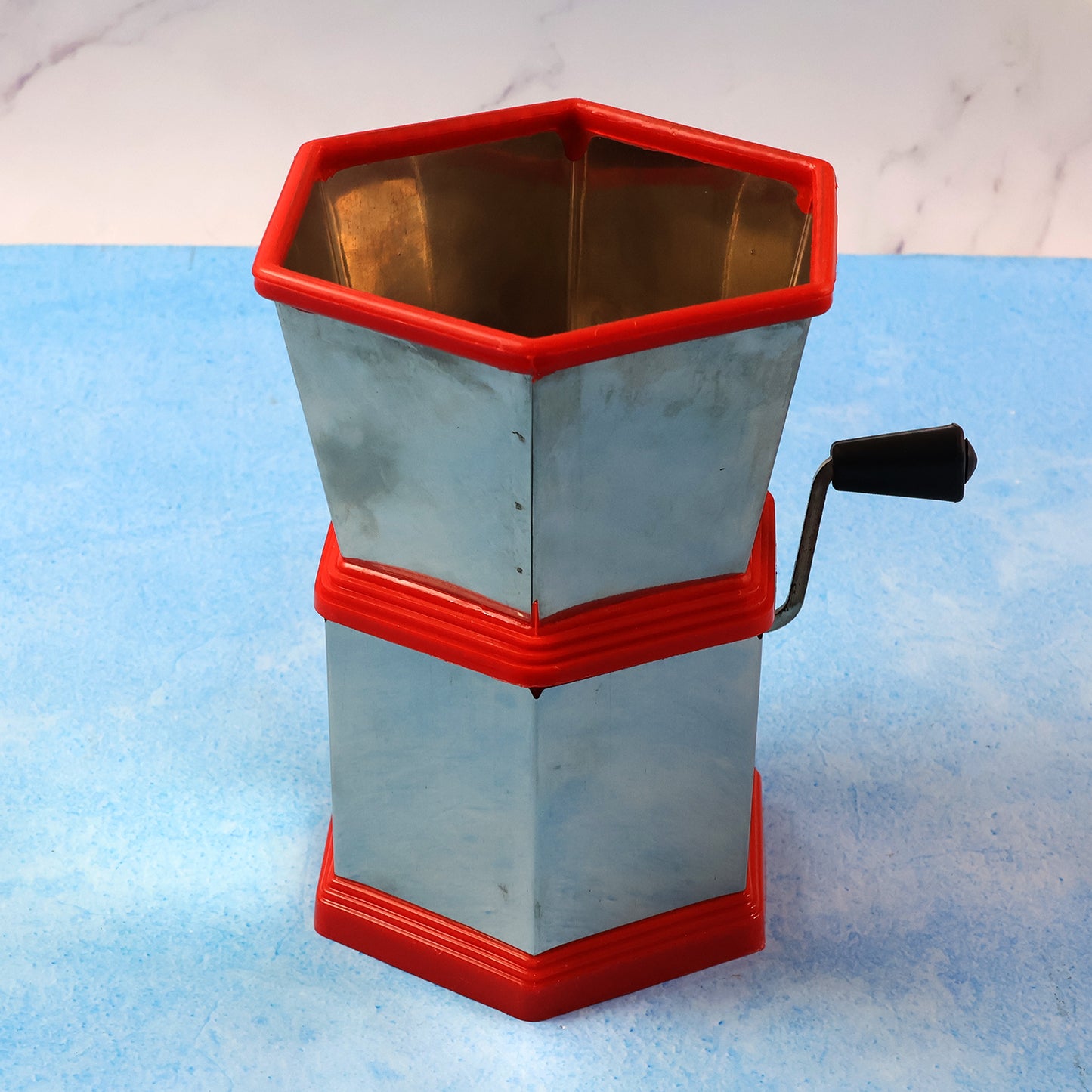 Wukusy manual hexagonal chili cutter with stainless steel blades and ergonomic handle for efficient chili slicing.