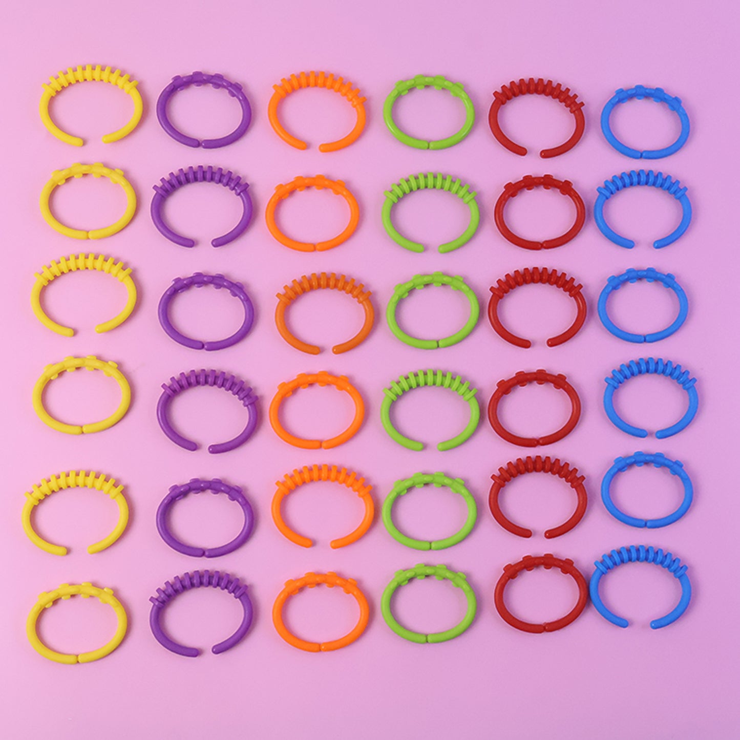 Wukusy Baby Learning Links educational toy set with 36 colorful plastic linking rings for early developmental play.