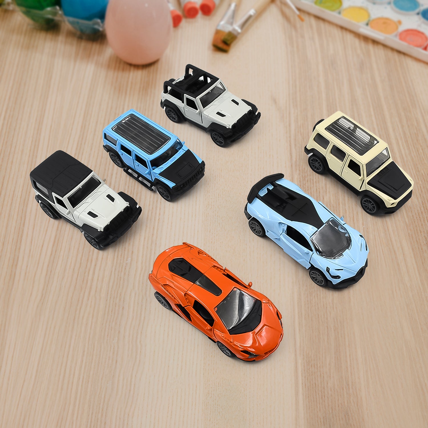 Colorful Wukusy mini pull-back toy car for kids, showing a small, vibrant toy with a sleek design and mixed bright colors.