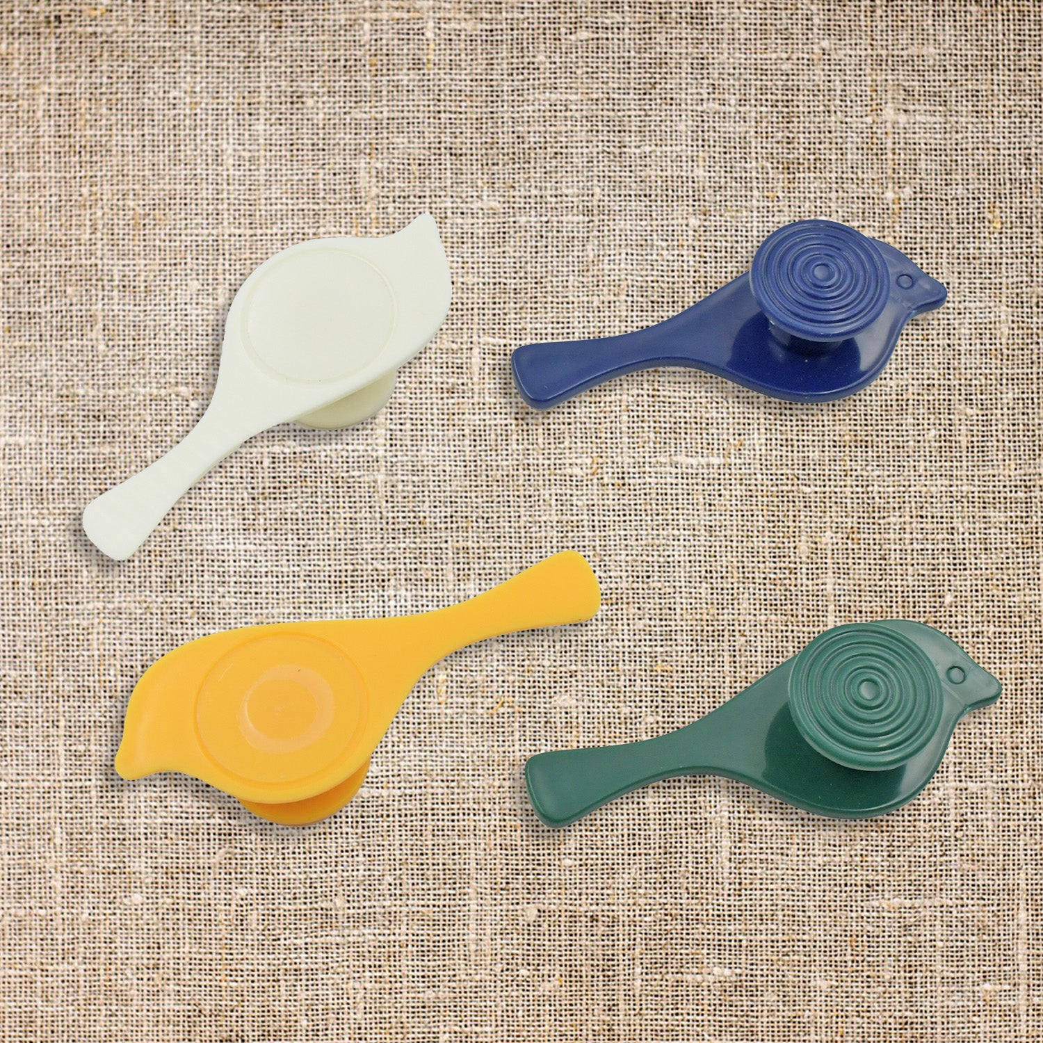 Set of four Wukusy adhesive wall hooks for towels, hats, coats, and doors, mounted on walls for versatile hanging solutions.