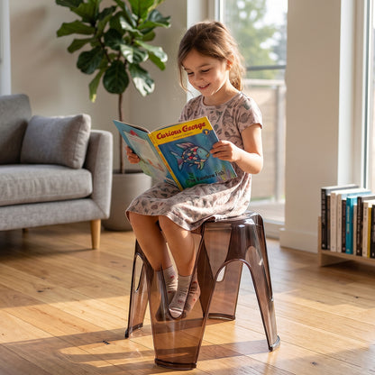 Wukusy durable plastic sitting stool suitable for home, bathroom, and outdoor use, shown in a natural outdoor setting.