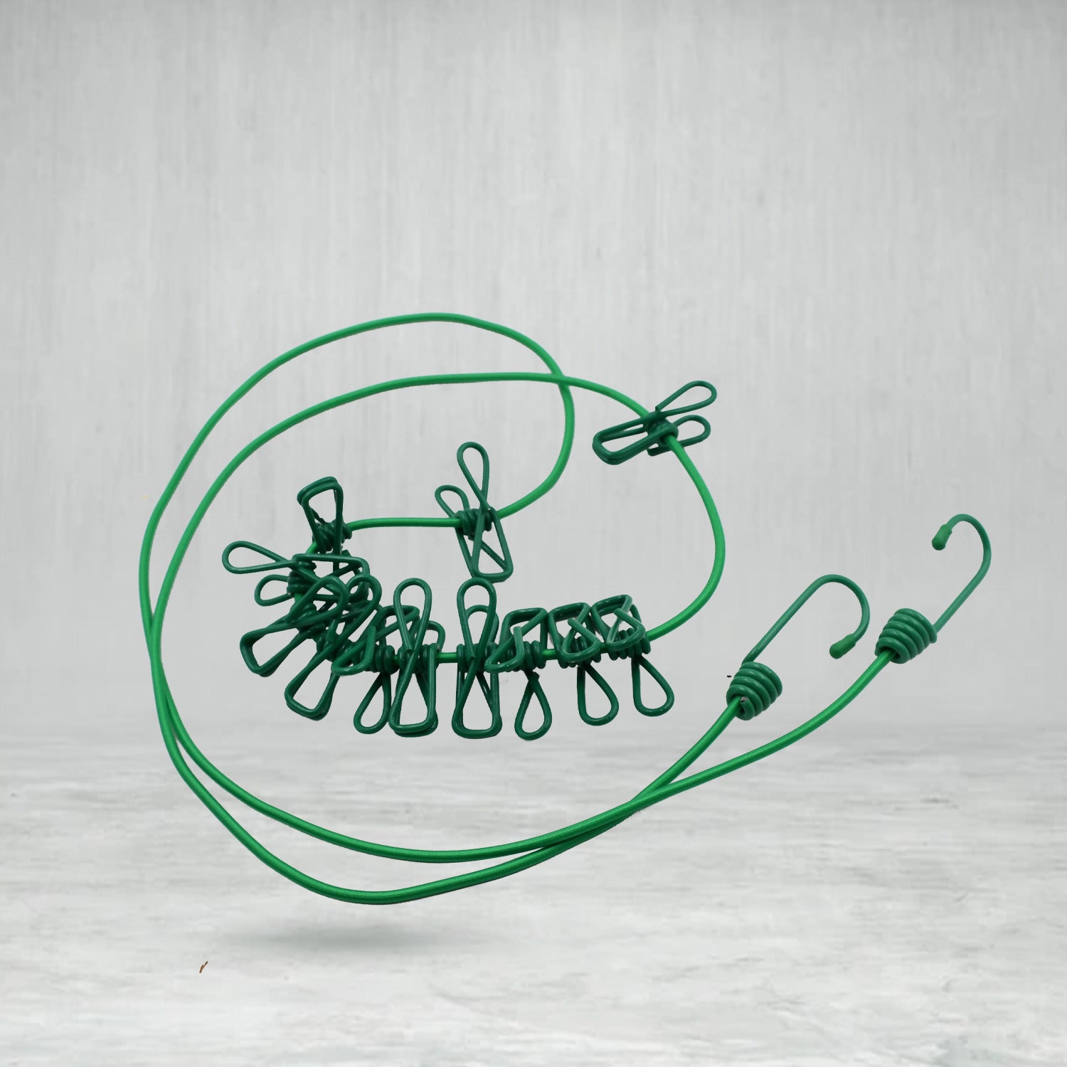 Wukusy elastic cloth drying rope with 12 metal clips, portable clothesline suitable for home or travel use.