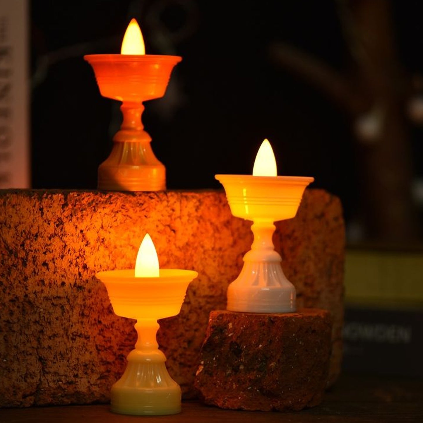 Set of 12 white water sensor LED diyas for home decor, featuring modern design and automatic lighting by Wukusy.