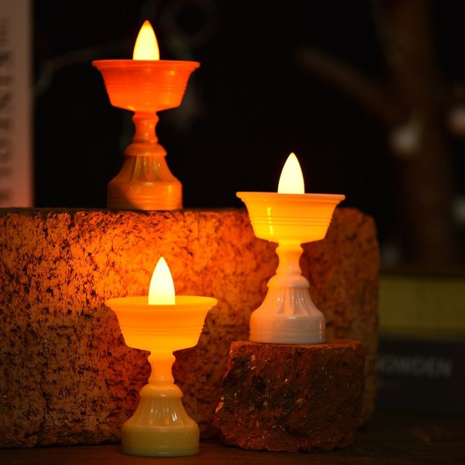 Set of 12 white water sensor LED diyas for home decor, featuring modern design and automatic lighting by Wukusy.