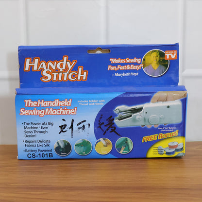 Portable Wukusy handheld sewing machine set with compact design, featuring a sewing handle, thread spool, and control buttons.