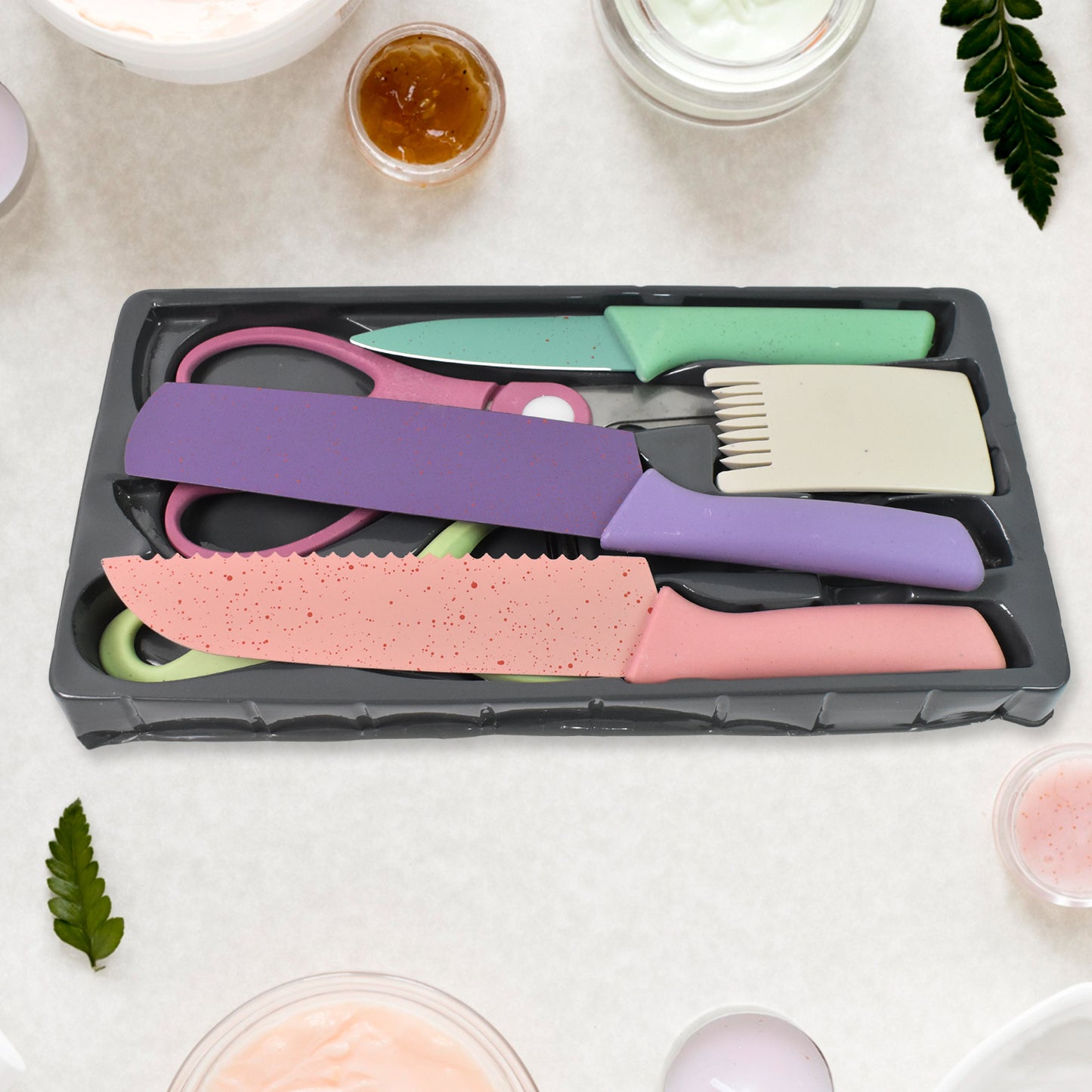 Set of six colorful Wukusy professional kitchen knives with stainless steel blades and ergonomic handles for home cooking.