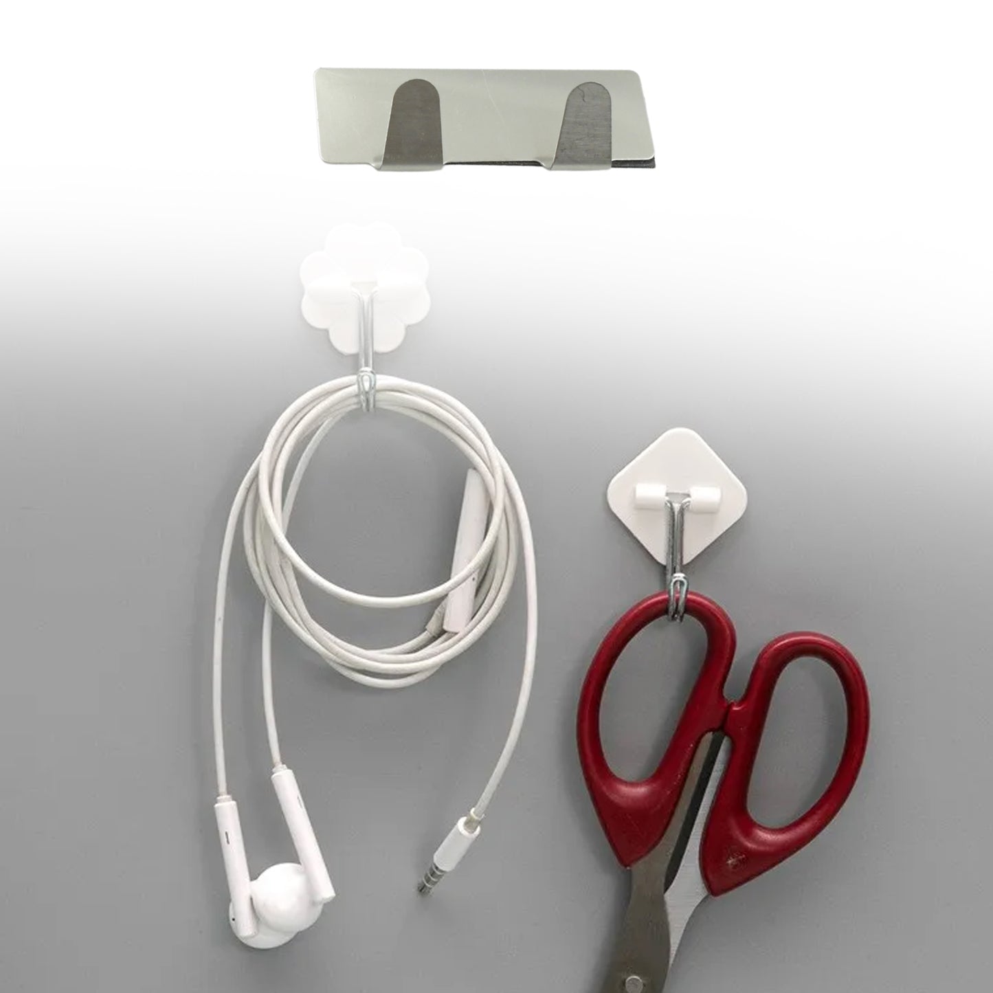 Set of six Wukusy stainless steel self-adhesive wall hooks with double hooks for bathroom, kitchen, tiles, and more.