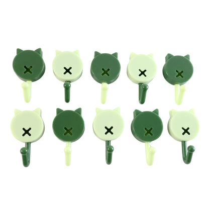 Set of 10 Wukusy self-adhesive round wall hooks for home improvement, shown mounted on a wall for convenient hanging.