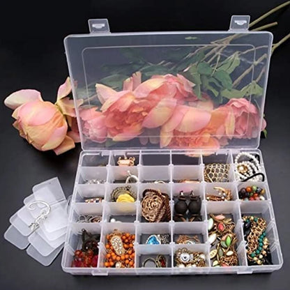 Wukusy 7673a clear plastic jewelry organizer box with 36 grids and adjustable dividers for home storage, transparent and compact.