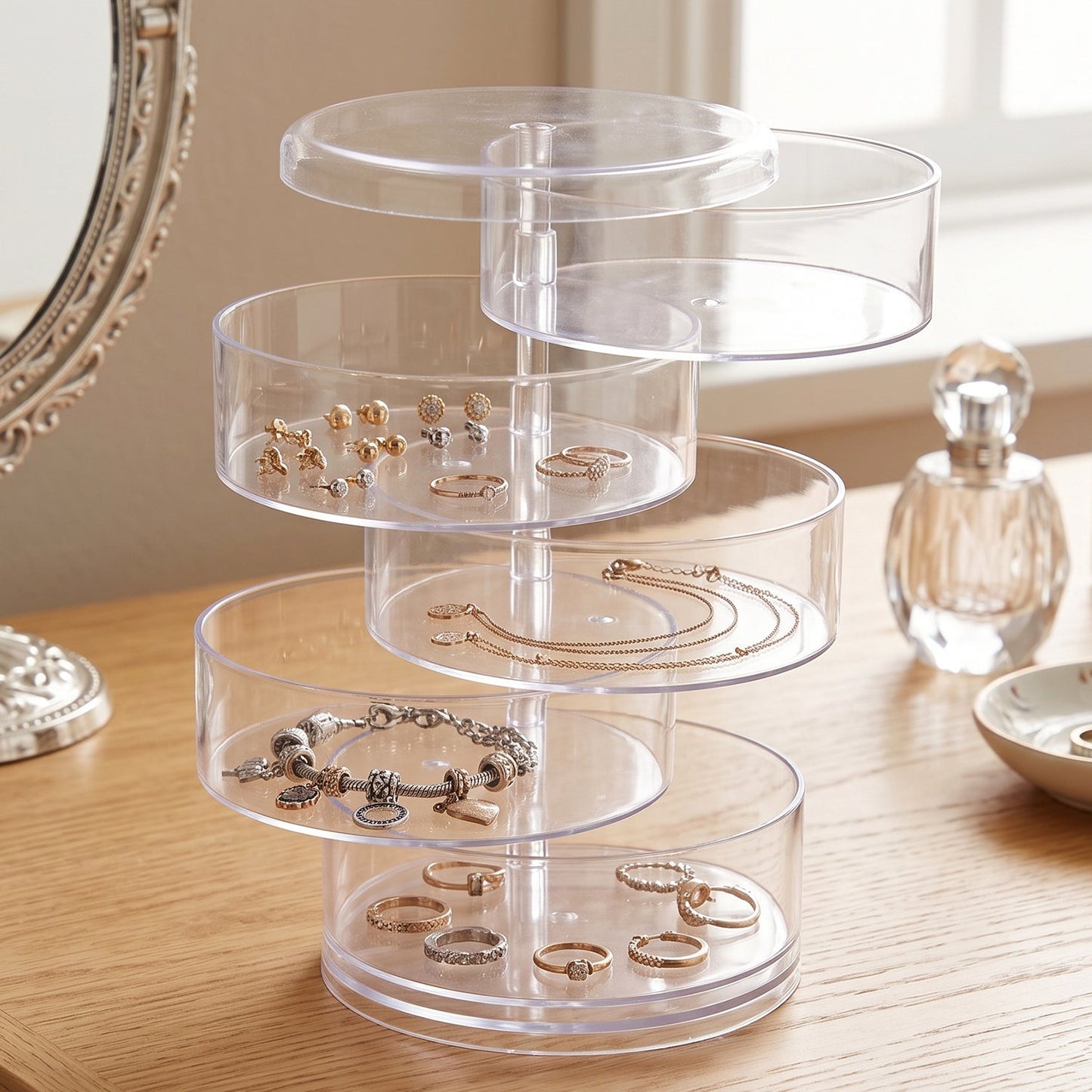 Wukusy 5-layer rotating jewelry storage box organizer with sections for rings, earrings, and watches, in a compact design.