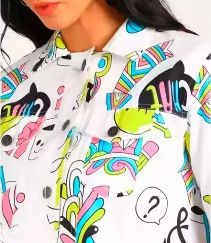Women’s printed denim jacket by Ekom, casual outerwear with colorful floral print and classic denim design.