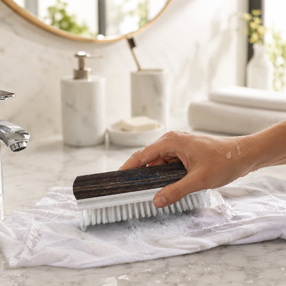 Wukusy Veepee Hard Golden Cloth Wash Brush with wooden handle for scrubbing and cleaning fabrics and surfaces.