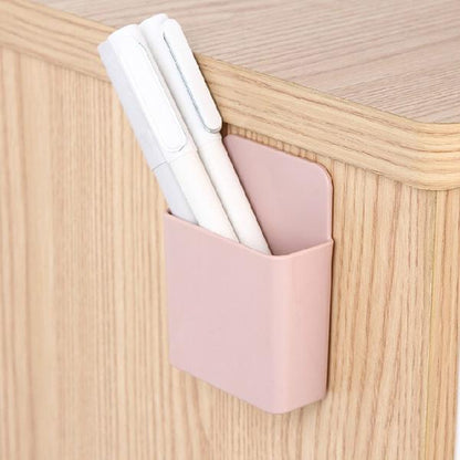 Set of four Wukusy wall-mounted storage cases with mobile phone charging ports, designed for organizing and charging devices.
