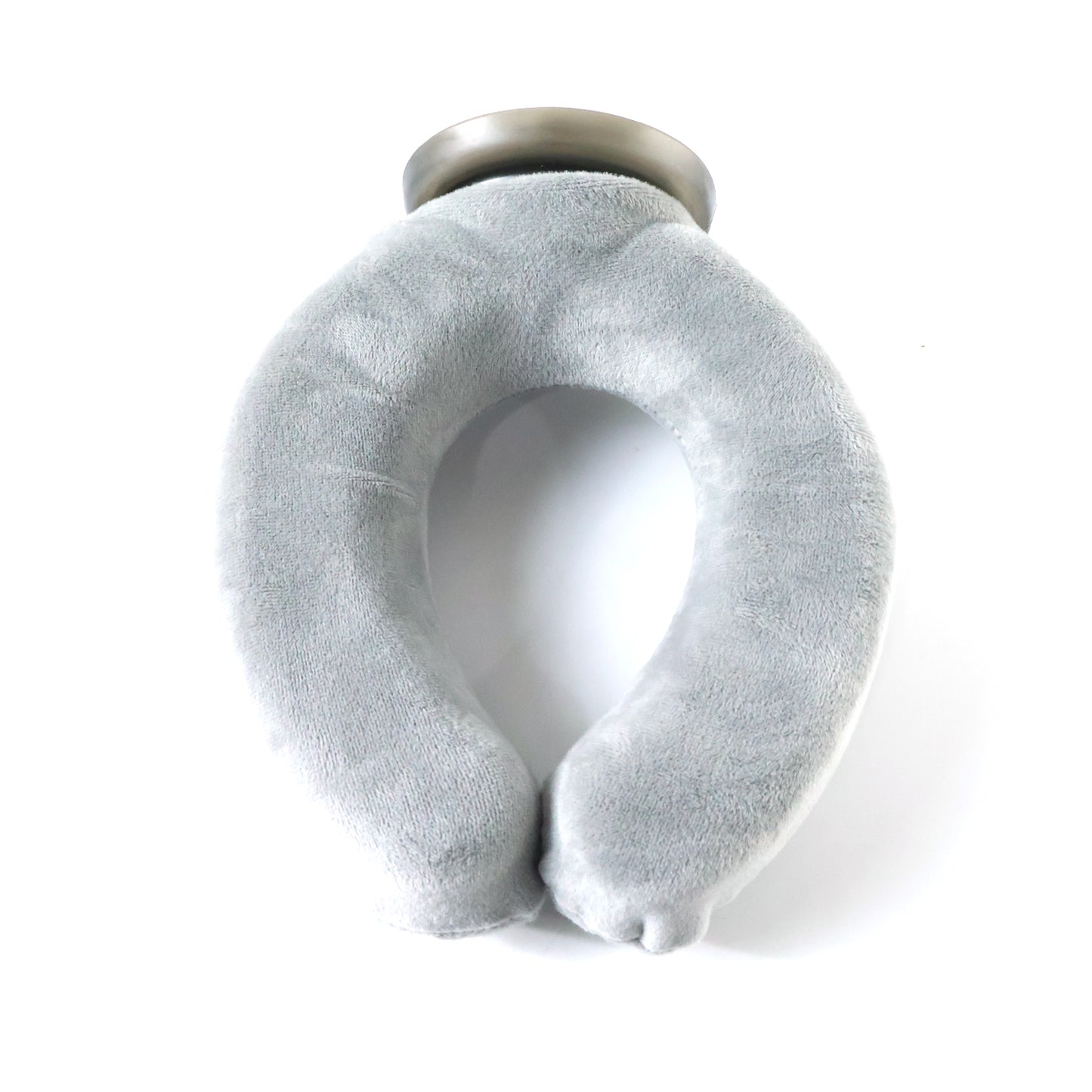 Wukusy multi-purpose U-shaped comfort support pillow on a bed, designed for neck and back support, in soft fabric.