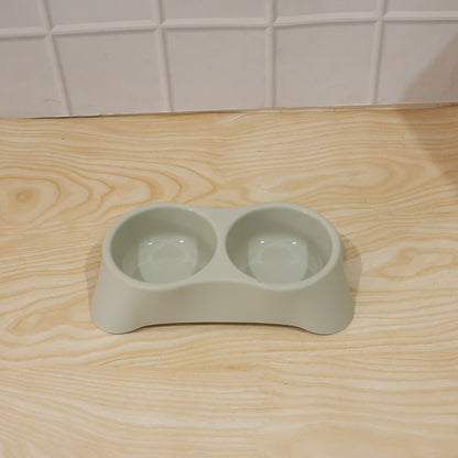 Wukusy dual pet food and water feeding tray with two bowls for dogs and cats, made of durable material, suitable for pets.
