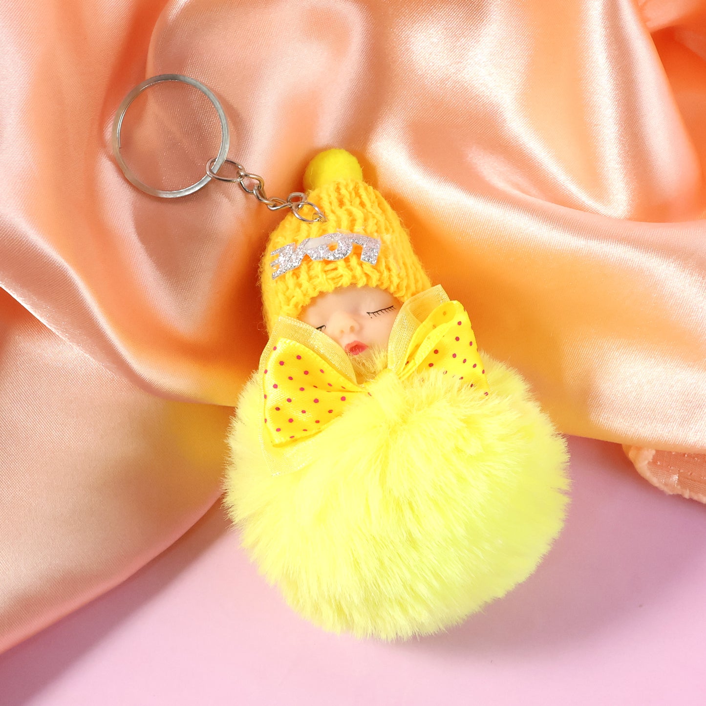 Wukusy cute plush doll keychain with soft fur ball, featuring a charming, huggable design for keys or bags.