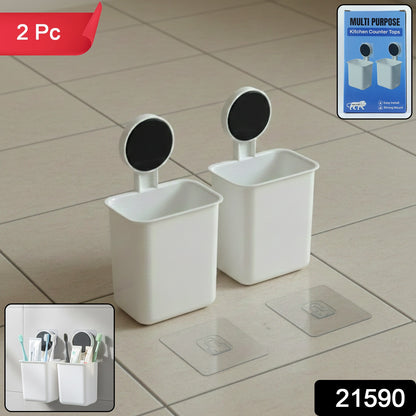 Two Wukusy wall-mounted plastic toothbrush holders with adhesive backing, designed for easy installation and bathroom organization.