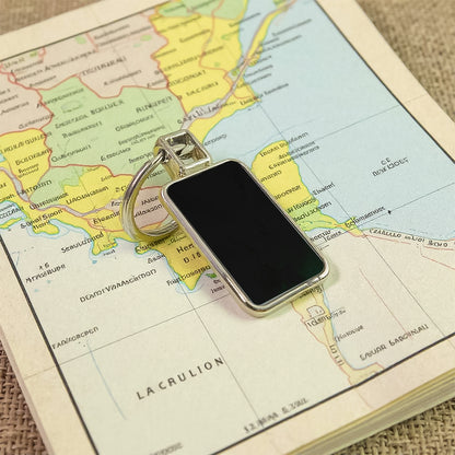 Black and silver metal rectangular keychain with Wukusy branding, featuring a sleek, polished design for everyday use.