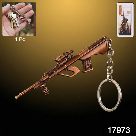 Metal gun-shaped keychain from Wukusy with detailed gun design, attached to a keyring for everyday use.