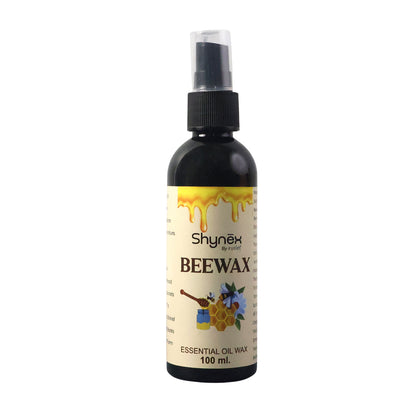 Wukusy Shynex Bee Wax Essential Oil Spray bottle with yellow label and spray nozzle, close-up view of the product.
