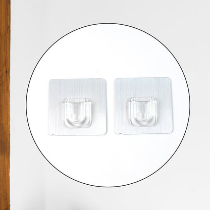 Self-adhesive towel rod by Wukusy, a convenient bathroom accessory mounted on a wall for hanging towels.