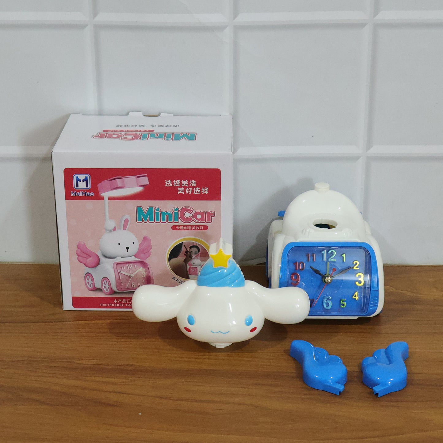 Cute cartoon bunny angel car-style table alarm clock by Wukusy featuring a charming bunny design with angel wings.