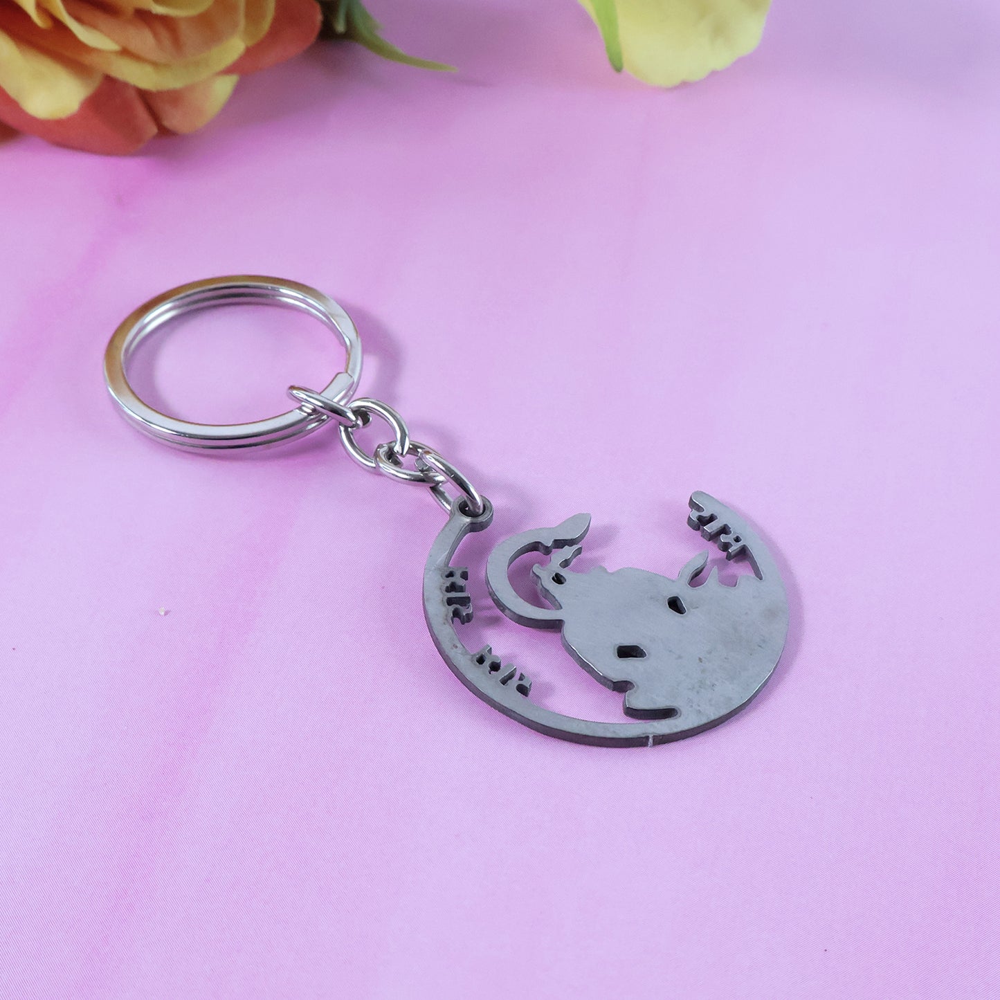 Metal Jai Shri Ram keychain with Hindu devotional design, featuring intricate detailing and Wukusy branding.