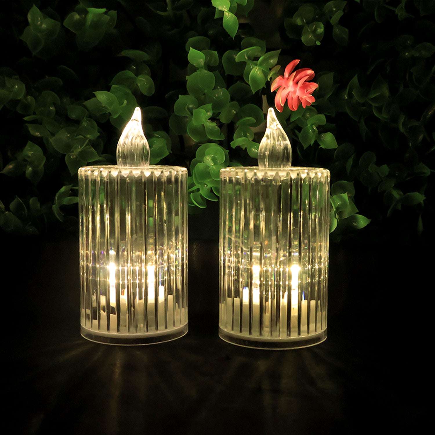 Eight Wukusy premium crystal effect LED flameless candle lights for home decor, with glowing, realistic candle flame appearance.