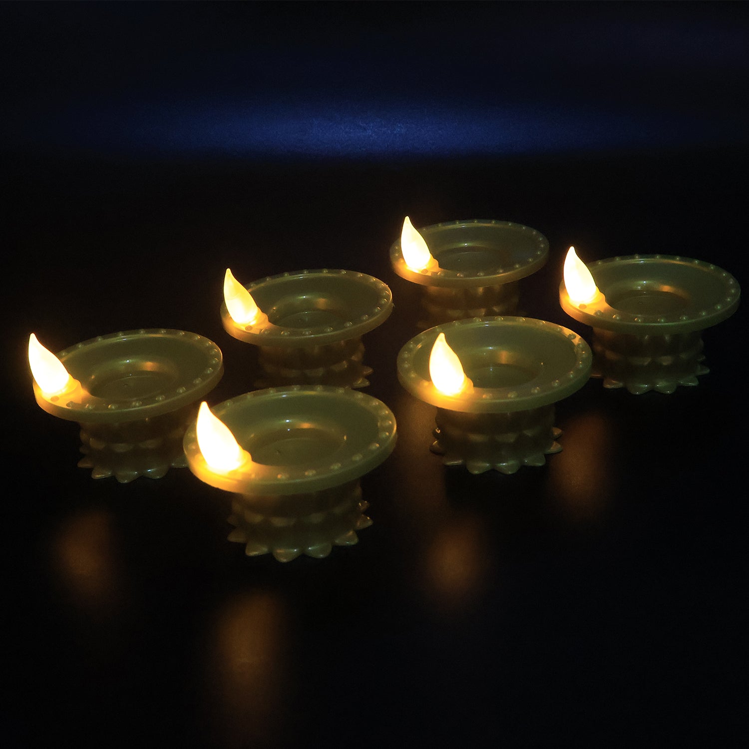 Set of 12 Water Sensor LED golden diyas for home decor, featuring water-sensitive lighting and decorative design by Wukusy.