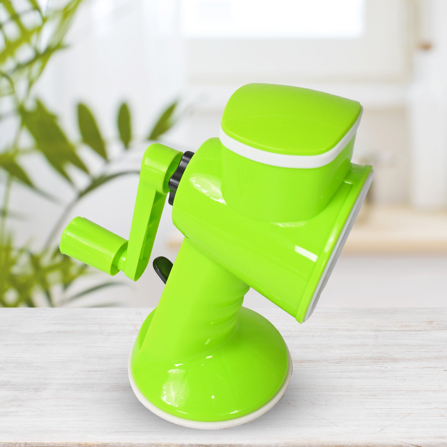 Wukusy 6-in-1 vegetable cutter and slicer with removable blades, compact hand-operated kitchen tool for chopping and slicing vegetables.