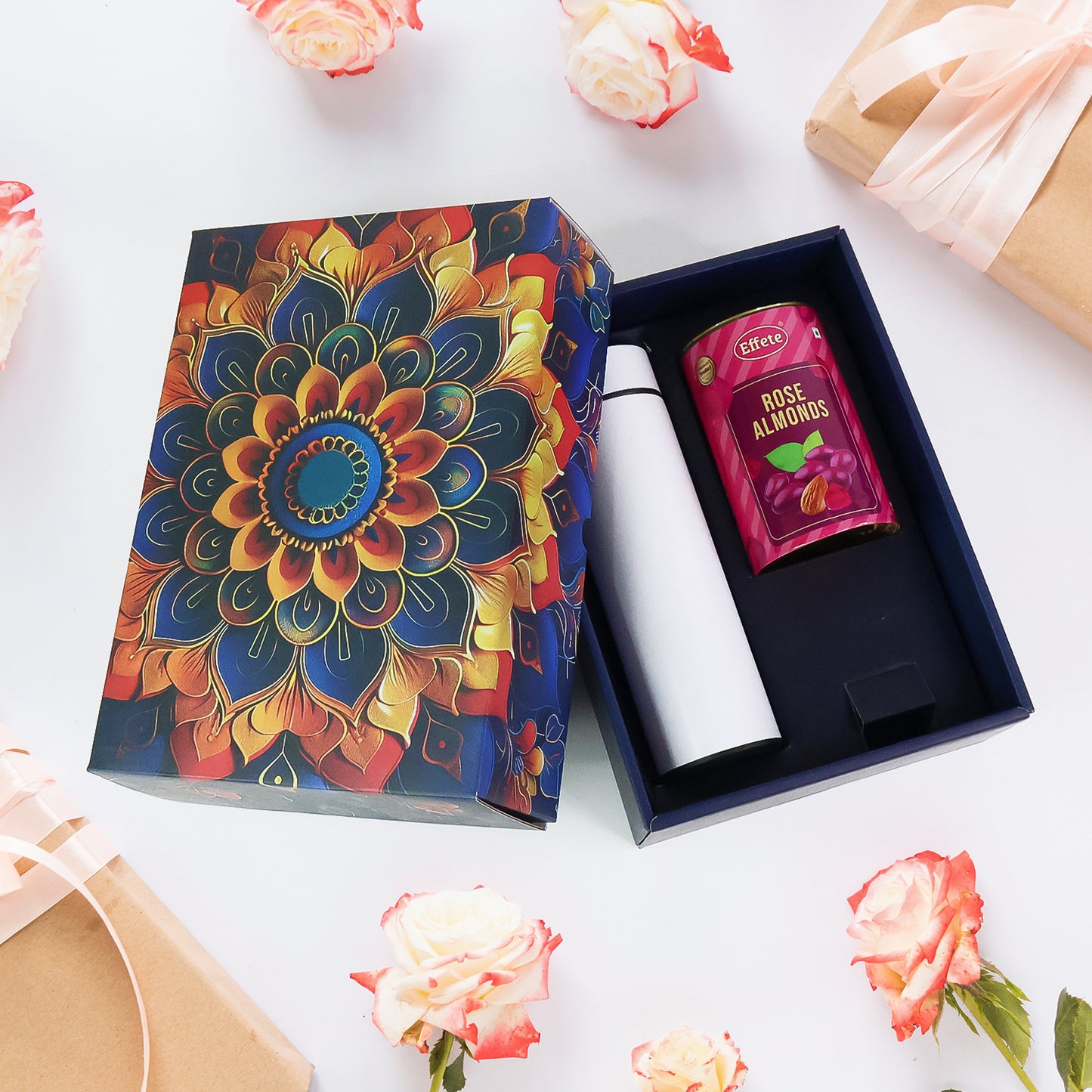 Wukusy Effete Rose Almonds Gift Hamper with a golden bottle, featuring elegant packaging and almonds for home and kitchen use.
