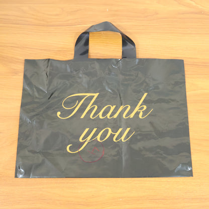 Wukusy premium thank you printed carry bag with handles, 25.34 cm, showcasing elegant thank you message on durable paper bag.