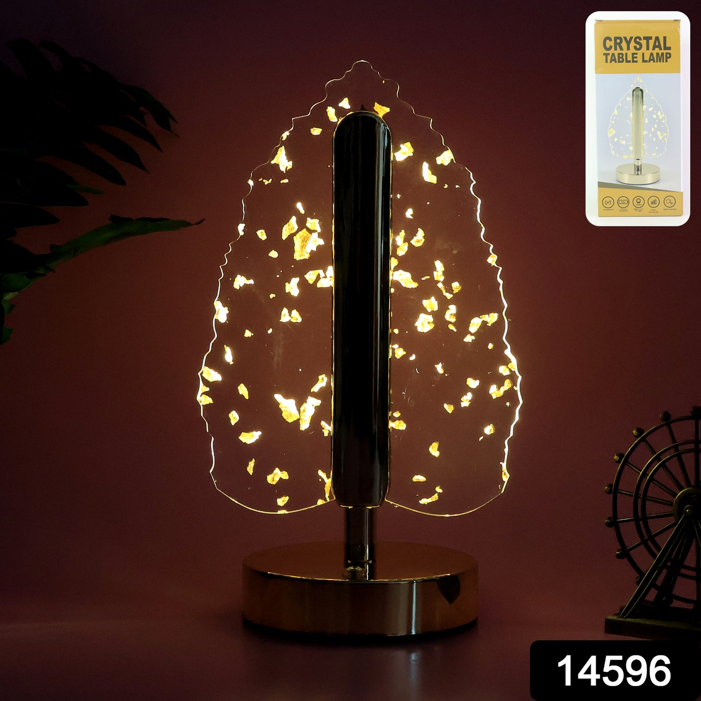 Golden crystal leaf-shaped LED table lamp by Wukusy, elegant home decor with warm lighting and intricate leaf design.
