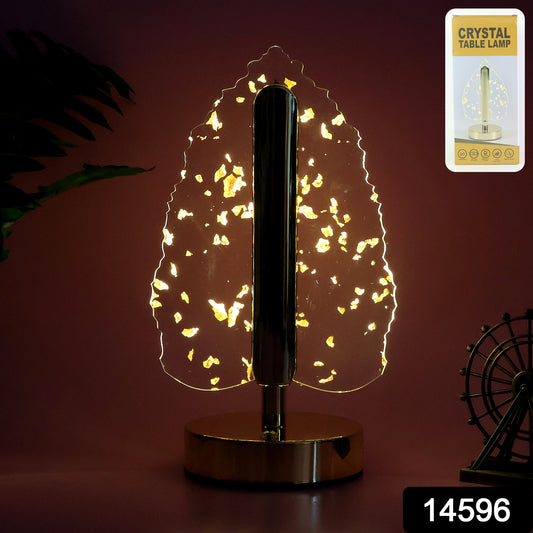 Golden crystal leaf-shaped LED table lamp by Wukusy, elegant home decor with warm lighting and intricate leaf design.